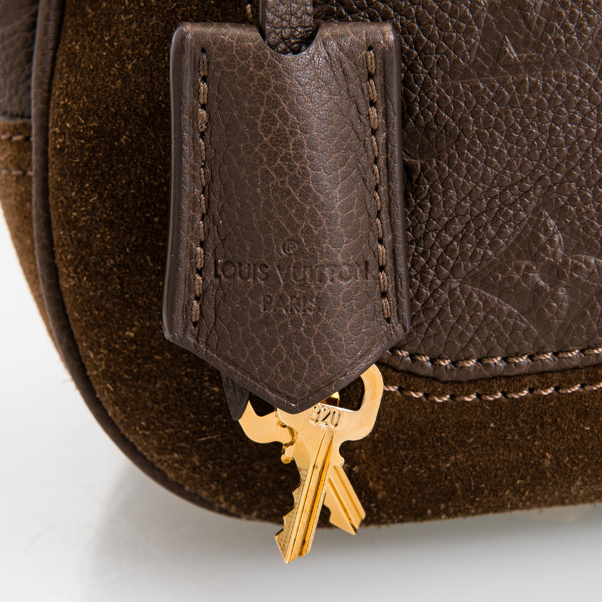 Louis Vuitton, Monogram Empreinte Suede Audacieuse Bag.