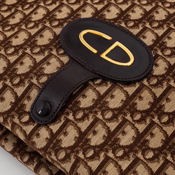 Christian Dior, a canvas tote bag.