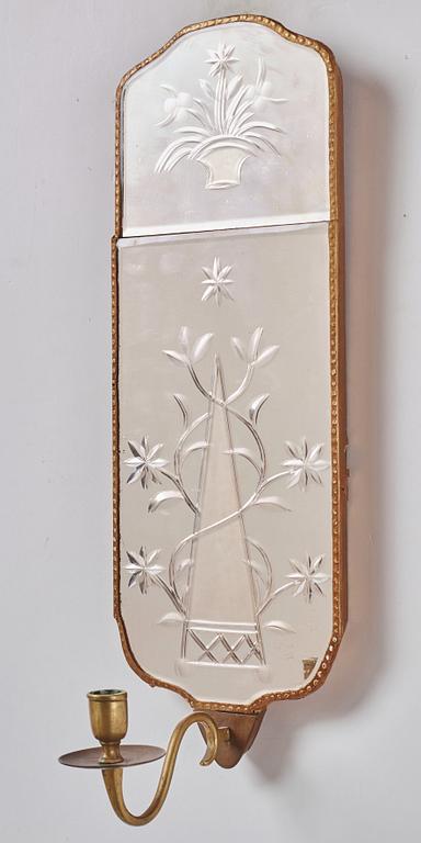 A pair of Gustavian-style giltwood and engraved glass one-light girandole mirrors, circa 1900.