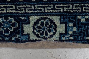 A rug, semi-antique Baotou, ca 121-122 x 59-61 cm.