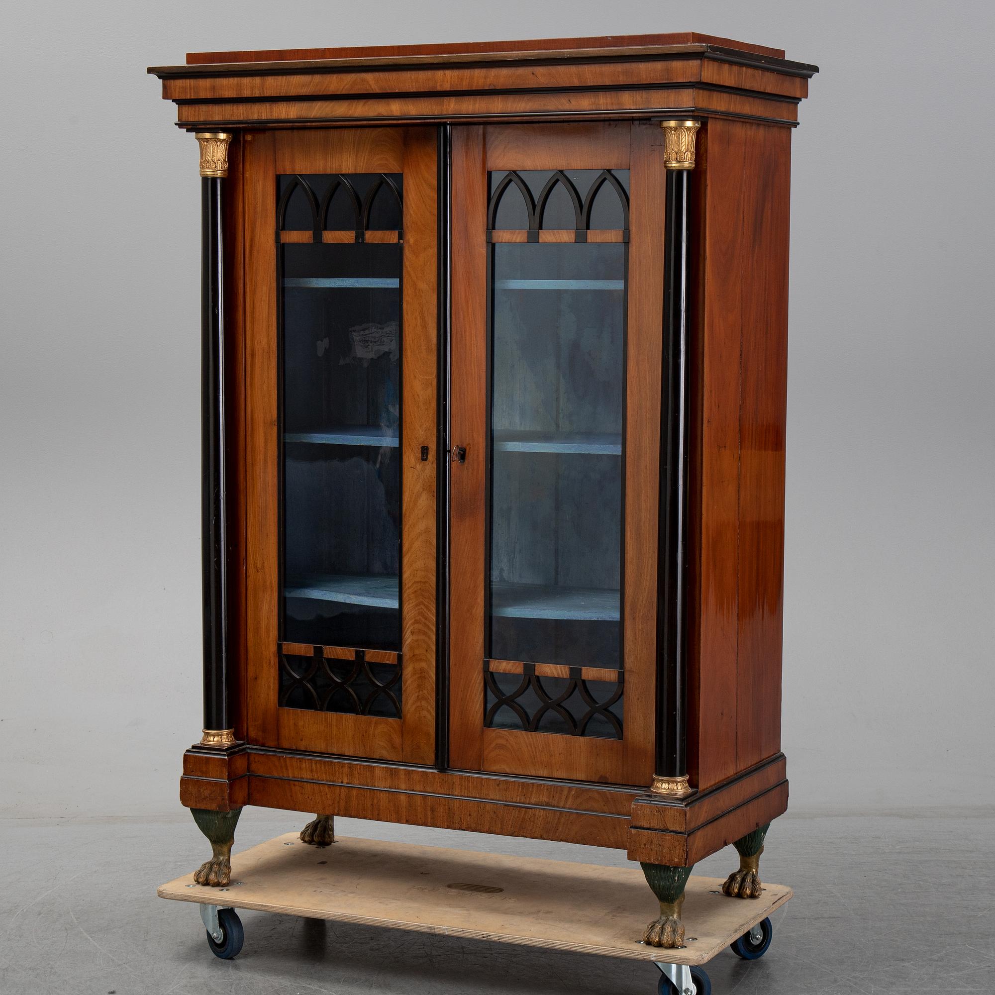 An Empire mahogany cabinet, first half of the 19th Century.