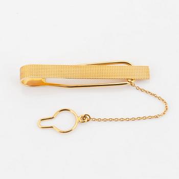 Patek Philippe, slipsnål och manschettknappar.