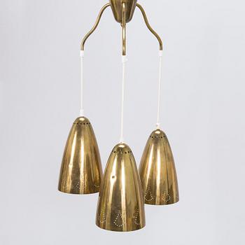 A mid-20th-century brass pendant ceiling light.