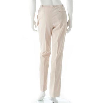 HERMÈS, a pair of creme colored silk pants.