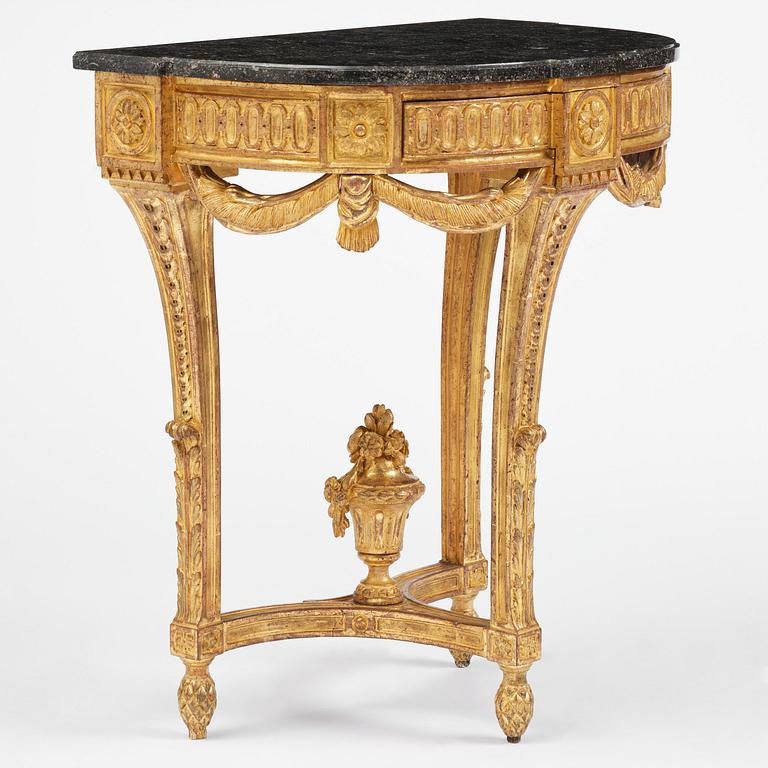 A Gustavian carved giltwood console table, Stockholm, late 18th century.