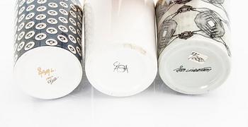 Åsa Lindström,  a set of three signed porcelain mugs.
