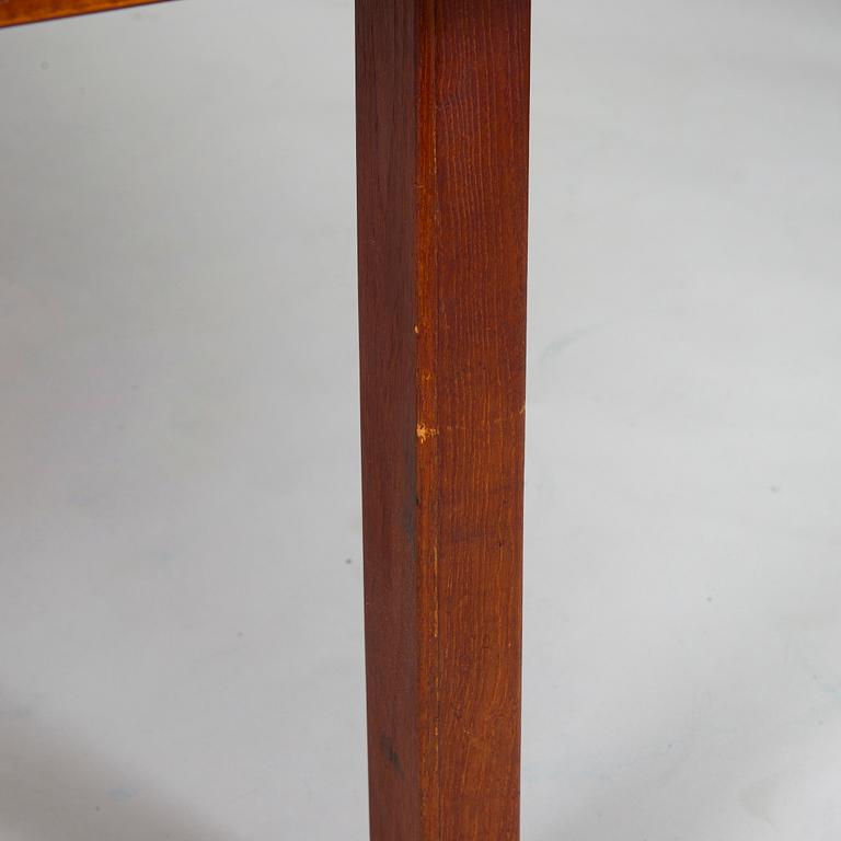 Carl Gustaf Hiort af Ornäs, a mid-20th-century 'Näyttely Senior' dining table and 12 chairs for HMN Huonekalu Nupponen.
