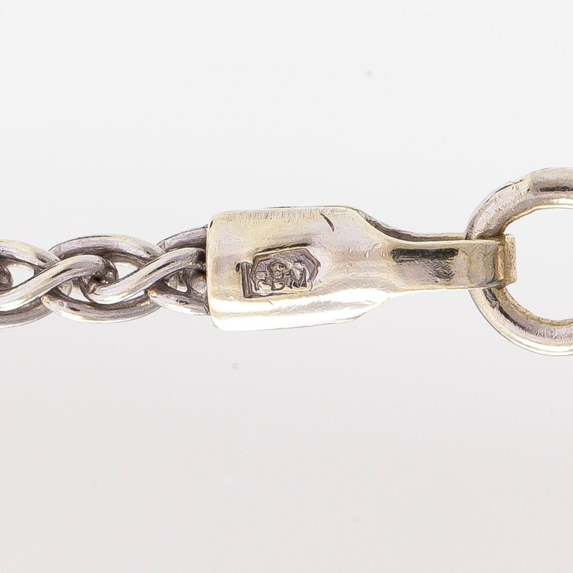 Necklace/pendant, cross, 14K white gold with diamonds totalling approx. 0.25 ct. Finnish hallmarks.