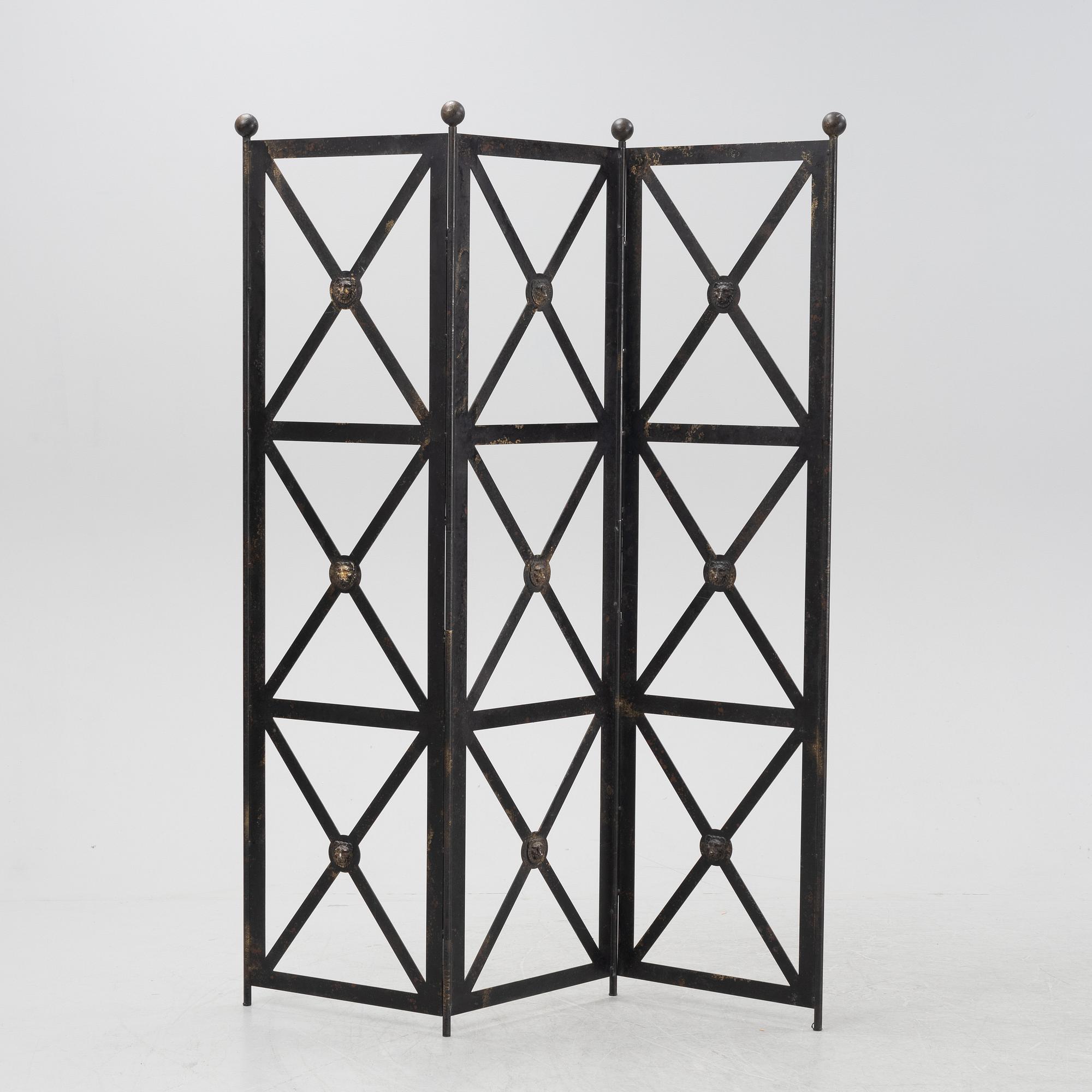 An contemporary open iron folding screen.