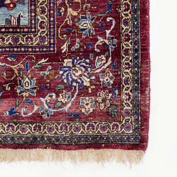An antique silk Kashan, rug, ca 198,5 x 129,5 cm.