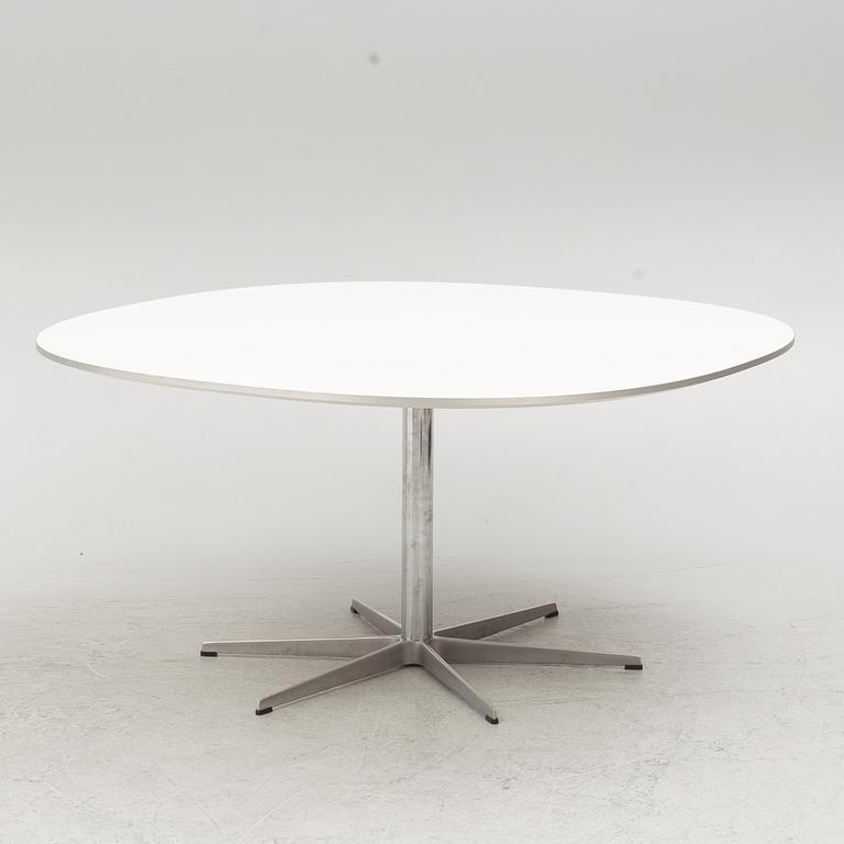 Arne Jacobsen, Bruno Mathsson & Piet Hein, a 'Super circle' dining table, Fritz Hansen, Denmark, 2007.