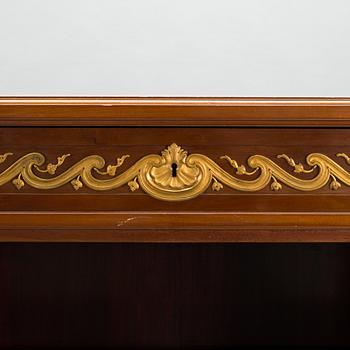 A 20th-century Louis XVI style bookcase.