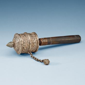 1517. A silver plated prayer wheel, Tibet/Nepal ca 1900.