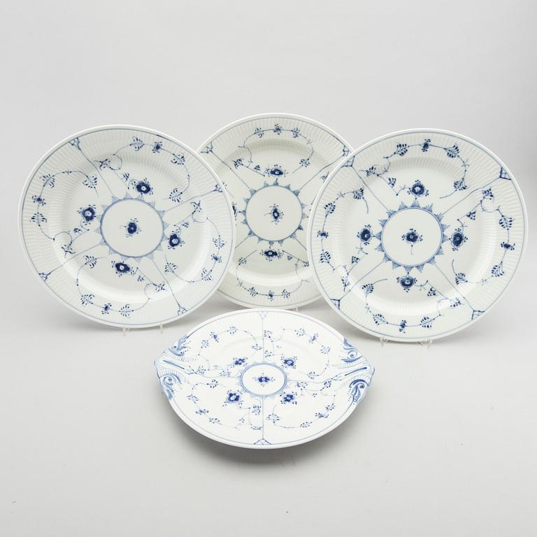 Four Royal Copenhagen Musselmalet porcelain serving dishes.