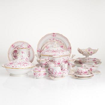 A 77-piece set of Meissen 'Indische malerei' porcelain tableware from the latter half of the 20th century.