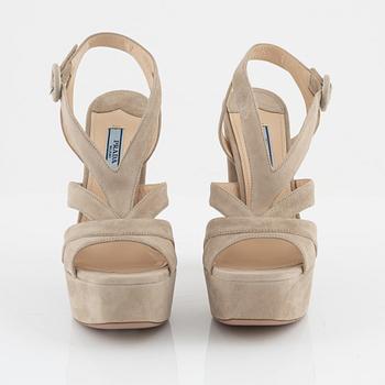 Prada, a pair of beige suede sandals, size 37.