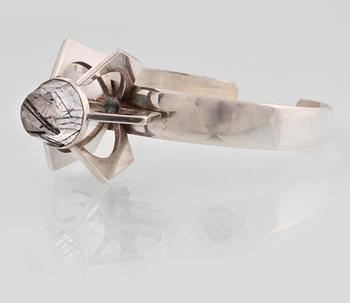 ARMRING, silver med fasettslipad rutilkvarts, Pege, Alton, 1967. Vikt 41,3 gram.