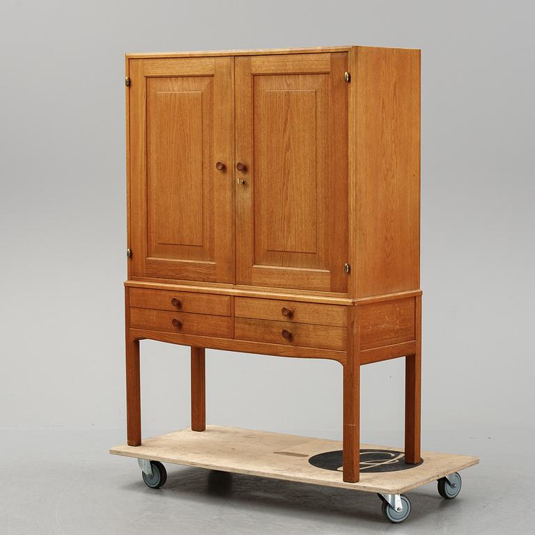 Carl Malmsten, a 'October' cabinet from the second half of the 20th century.