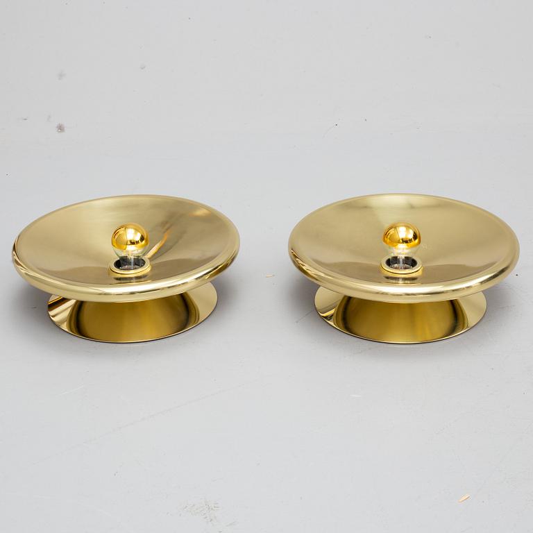 TOM DIXON, a pair of brass wall lamps.