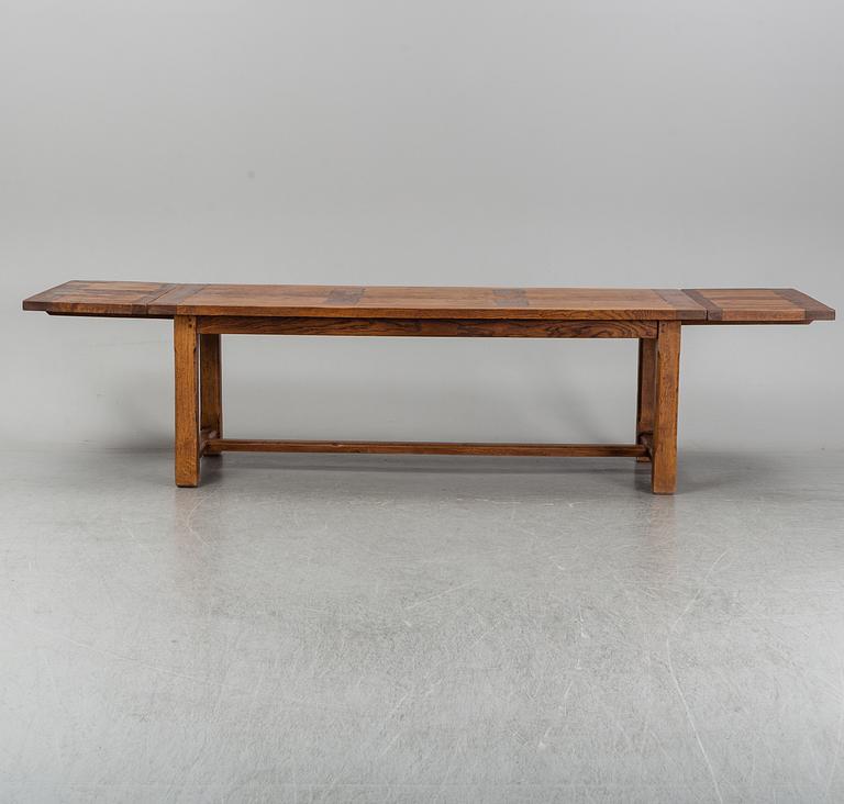 A mid 20th century oak dining table.