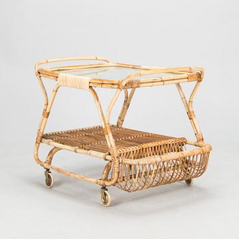 A mid 1900s bamboo and rattan serving trolley.