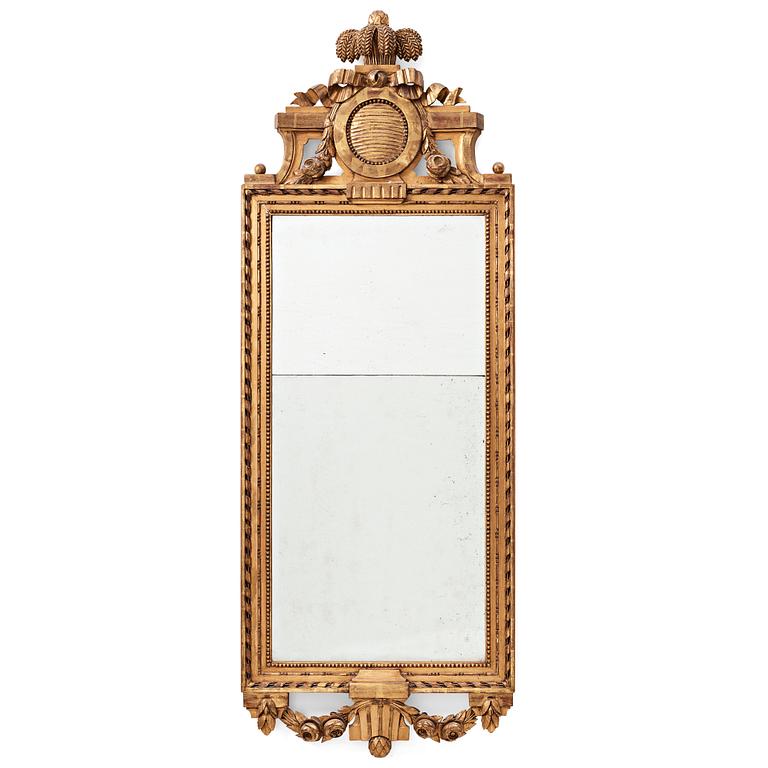 A gustavian mirror by Carl Gustaf Fyrwald (verksam 1776-1816). Stockholm hall mark, 1780s.