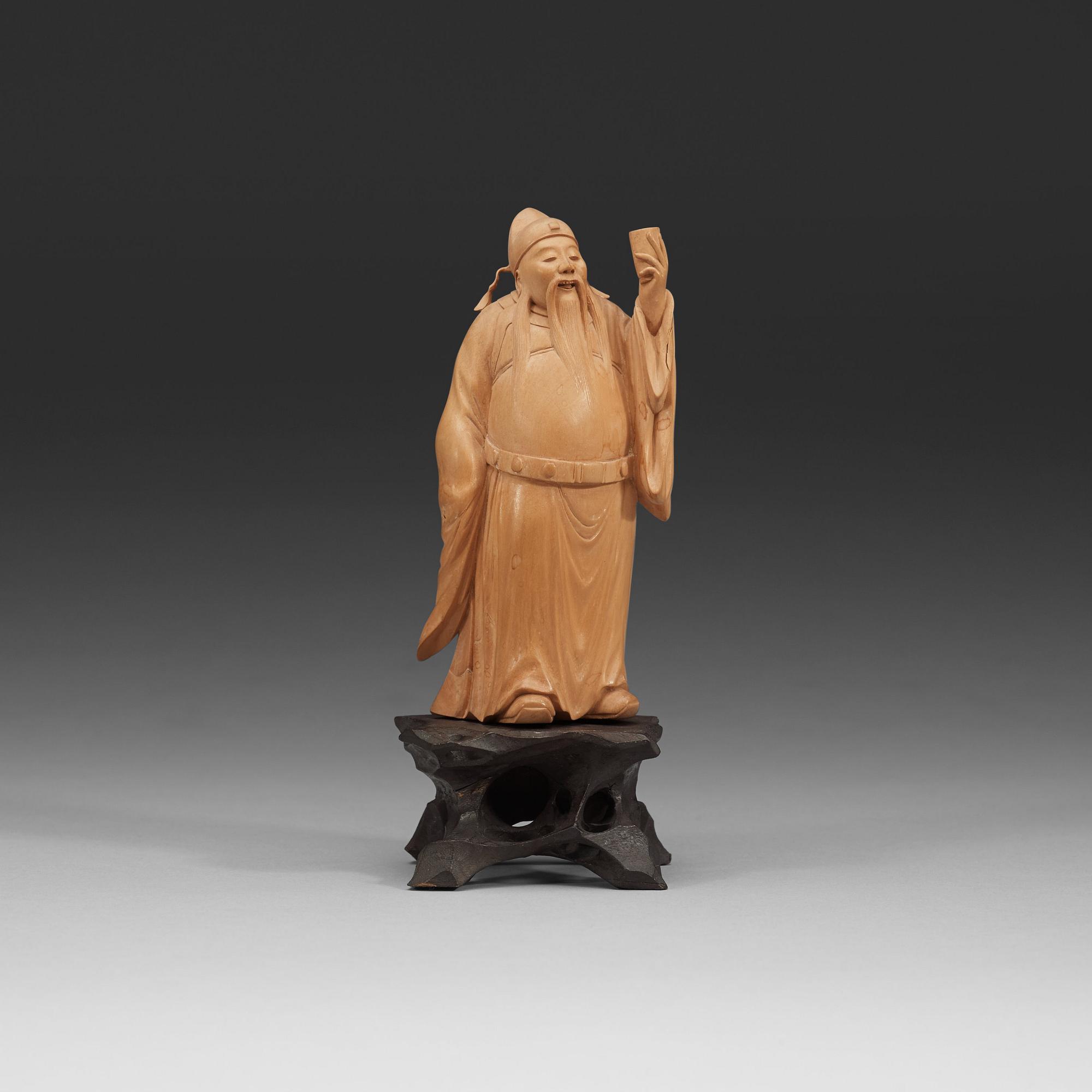 A finely carved boxwood figure of the Tang poet Li Bai (Li