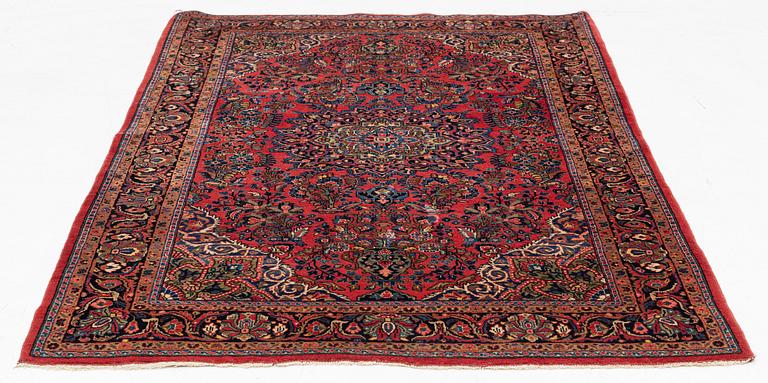 An American Sarouk rug, semi antique, c. 200 x 133 cm.