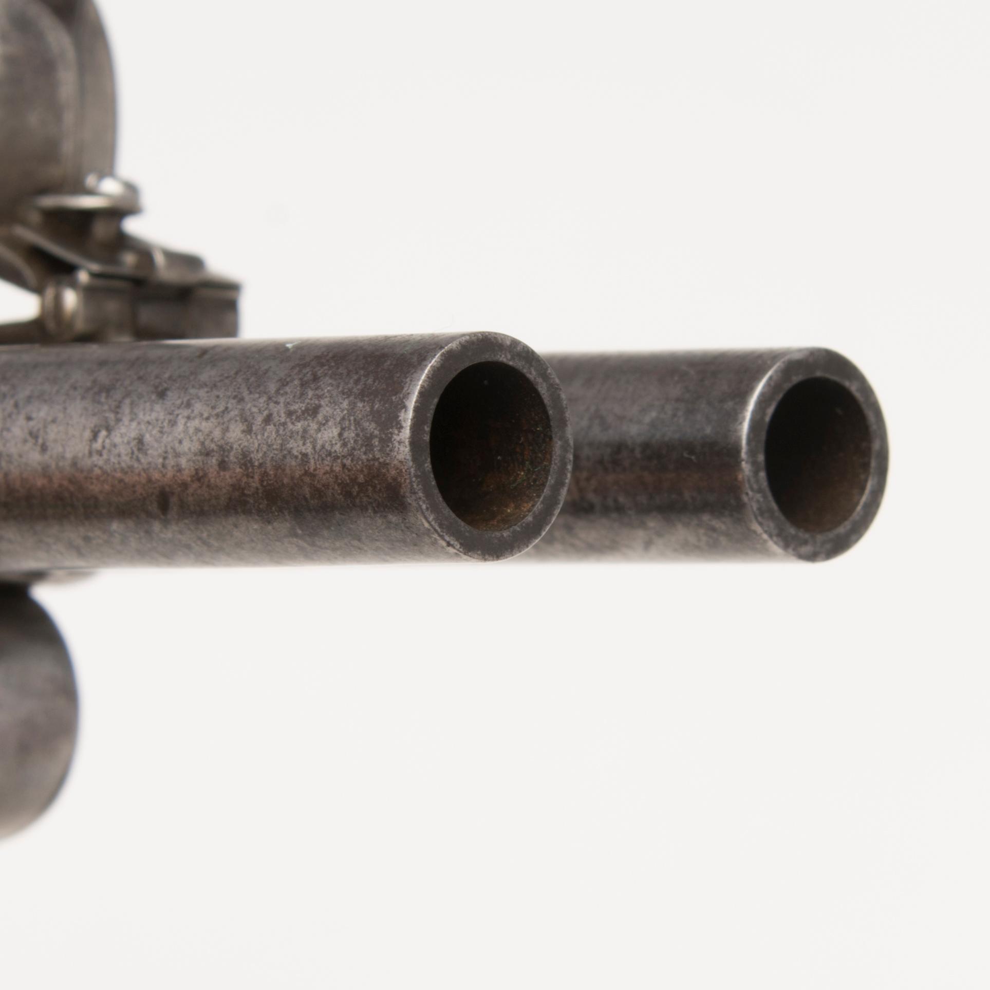 A pair of english boxlock flintock pistols marked E. Bond London, circa 1800.