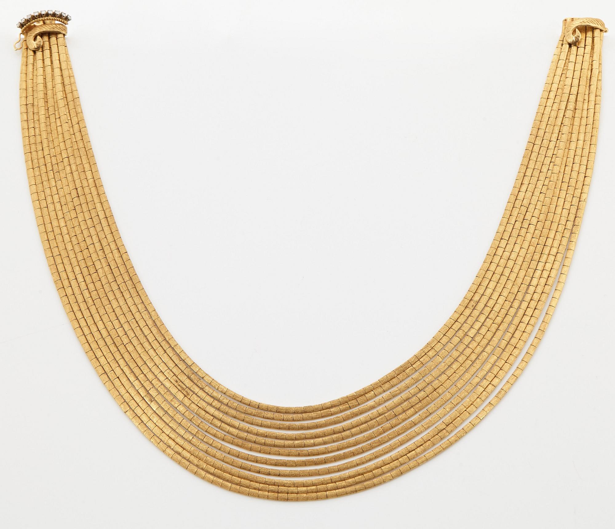 Collier 18K guld med runda briljantslipade diamanter.