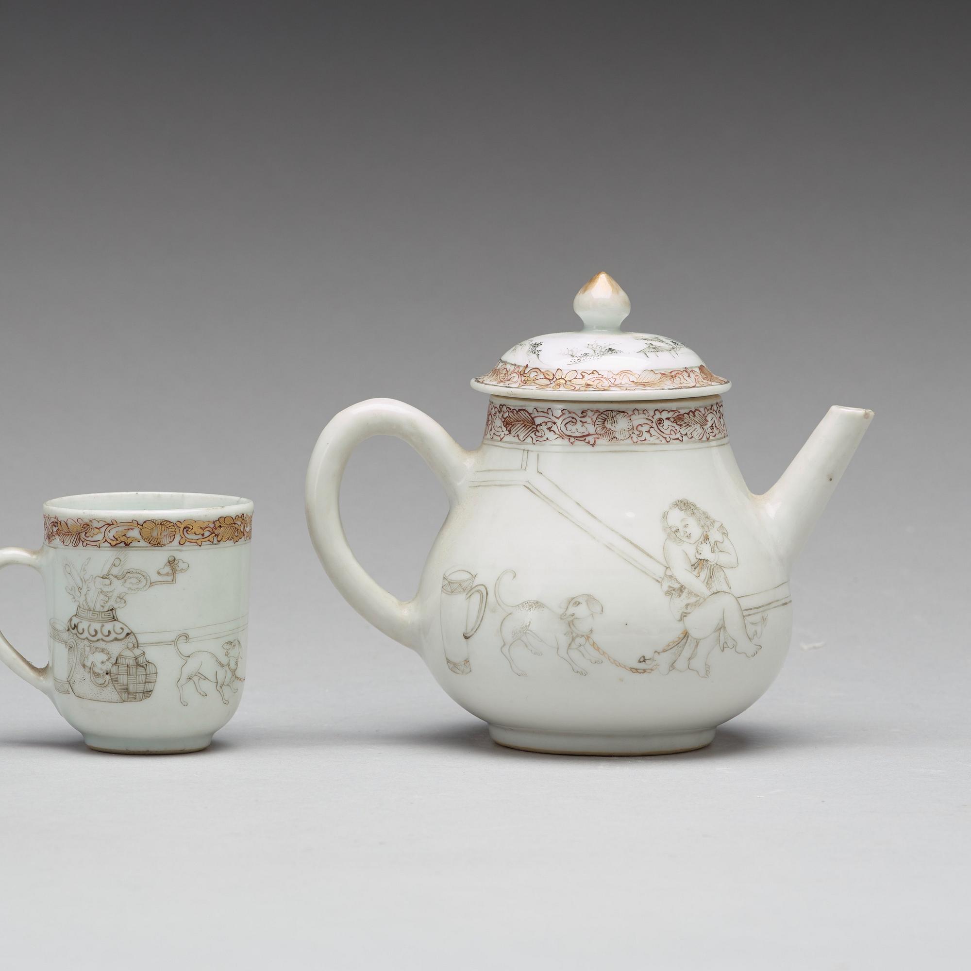 A grisaille and gold tea pot with cover and cup, Qing dynasty, Yongzheng (1723-35).