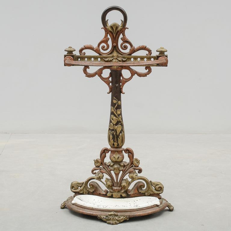 PARAPLYSTÄLL, gjutjärn, möjligen Bolinders, omkring sekelskiftet 1900.