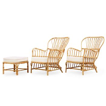 Josef Frank, a pair of rattan easy chairs and a stool, Svenskt Tenn Sweden.