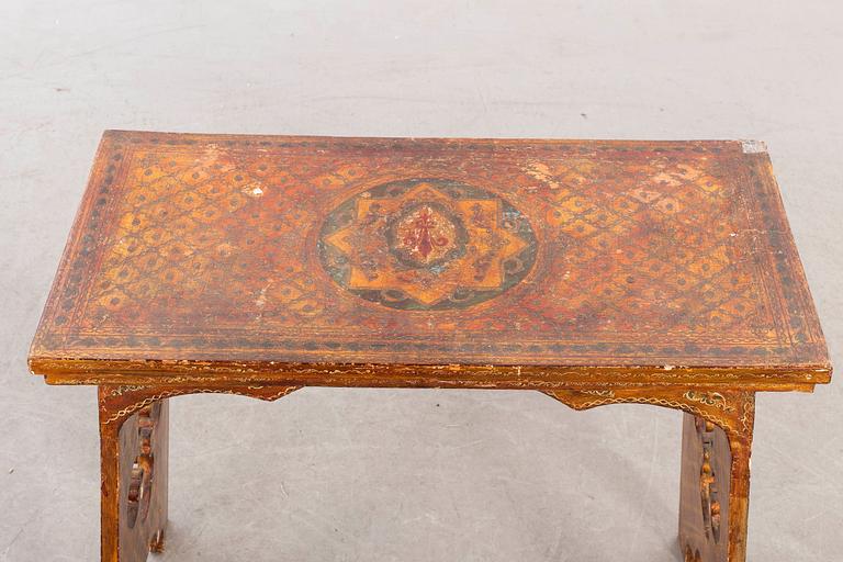 An mid 20th century wood table from Paoletti, Firenze Italy.