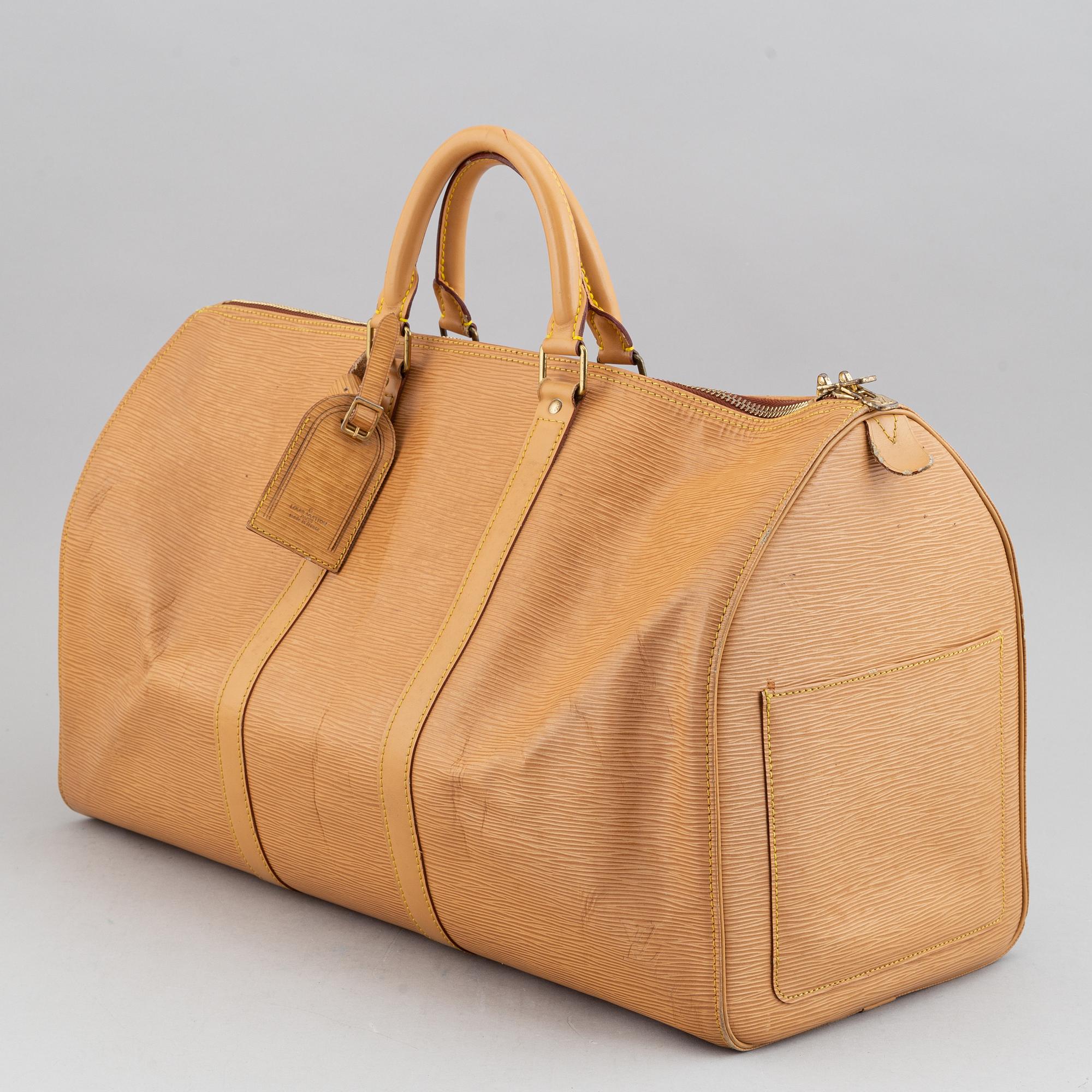 Louis Vuitton, am Epi 'Keepall 50' weekend bag.