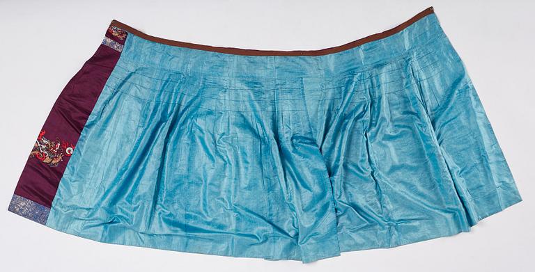 An embroidered silk skirt, Qing dynasty (1644-1912).