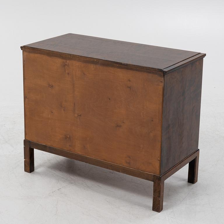 A 1930's stained birch chest of drawers.