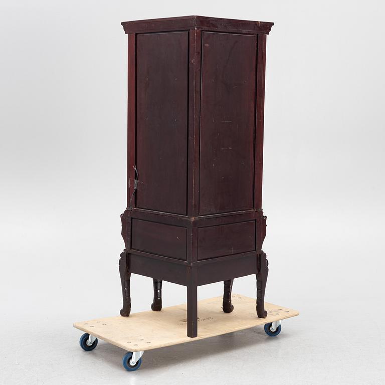 A display cabinet, China, 20th Century.