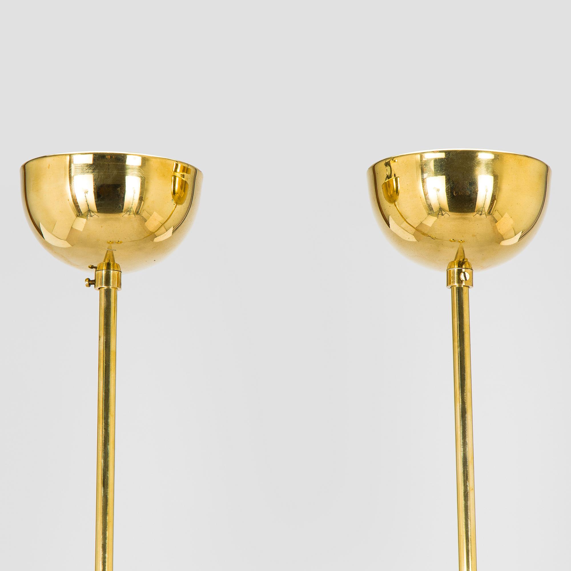 Paavo Tynell, a pair of mid 20th century ceiling lights, model 1699, for Taito / Idman.