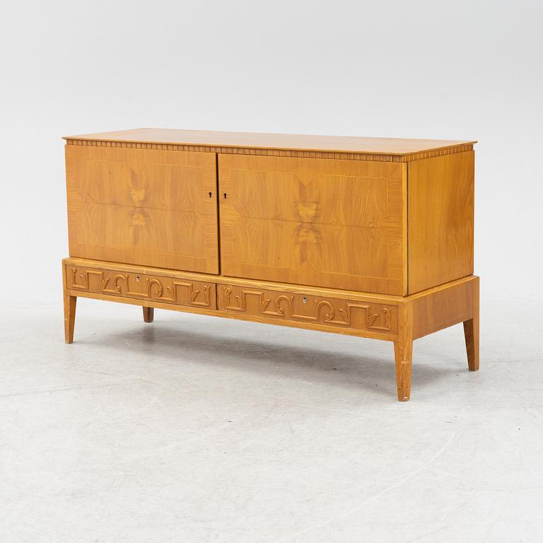 A Swedish Modern elmwood veneered sideboard, 1940's.