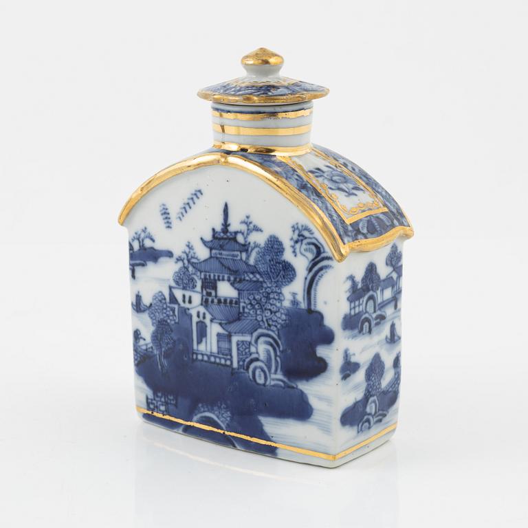 A Chinese tea caddy and porcelain dish with a soapstone sculpture, China, 18th/20th Century.