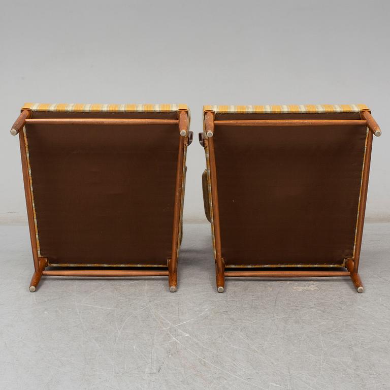 a pair of armchairs from the second half of the 20th century.