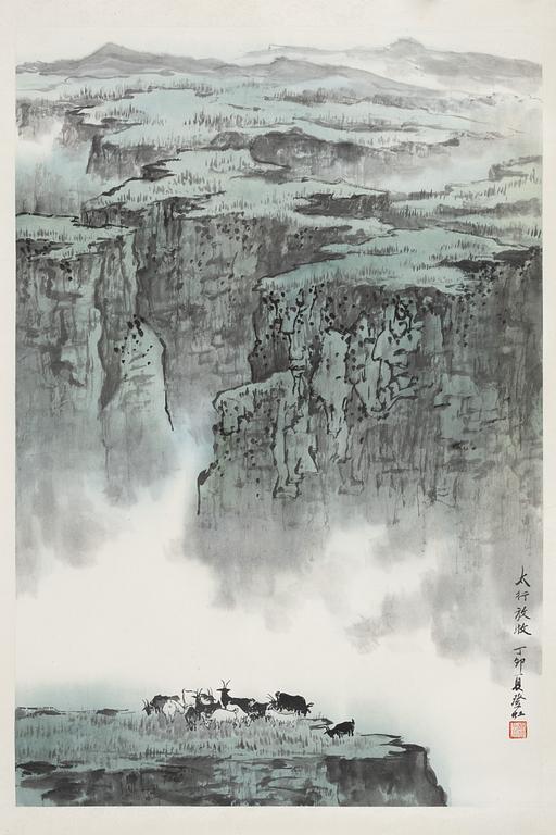 A scroll painting by goats in a landscape, ink and colour on paper, 20th Century. Signed Yang Denghong.