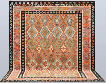 A Kilim carpet, approx. 301 x 257 cm.