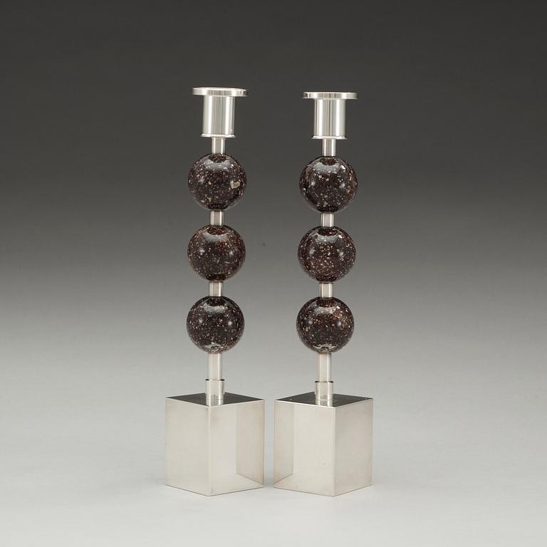 A pair of Sigurd Persson silver plated and porphyry candlesticks, Sweden.