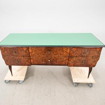 An Italian 1950s walnut sideboard.