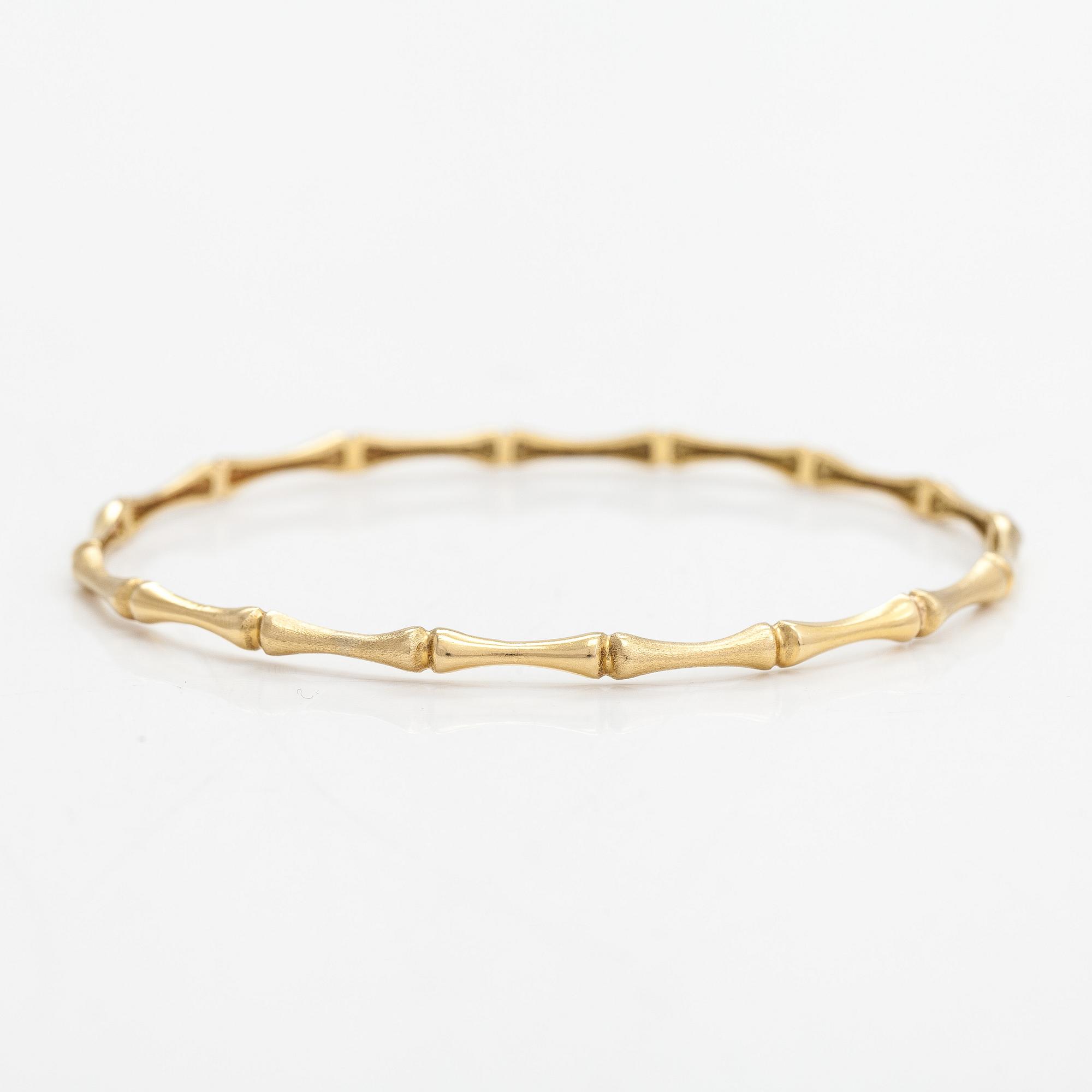 Rannekoru, 18K kultaa.