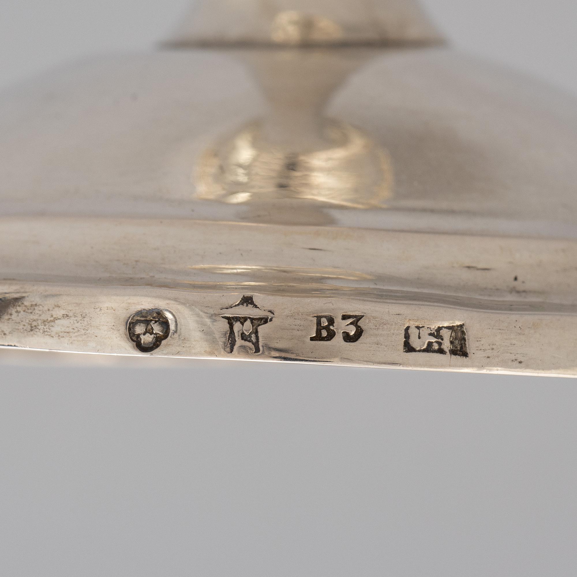 A Swedish 18th / 19th century silver beaker, cup and caster-spoon.