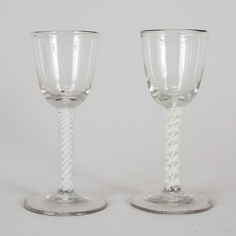 A pair of 18th century wine glasses.