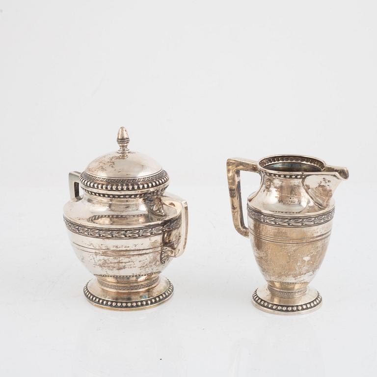 Sugar bowl and creamer, silver, 20th Century.